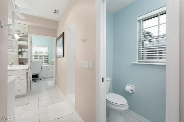 a kitchen with a sink a stove and a microwave