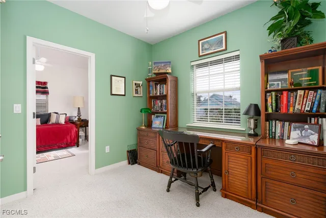 a bathroom with a sink mirror and vanity