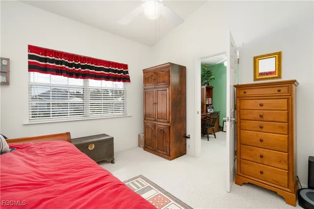 a view of a balcony with couch and wooden floor