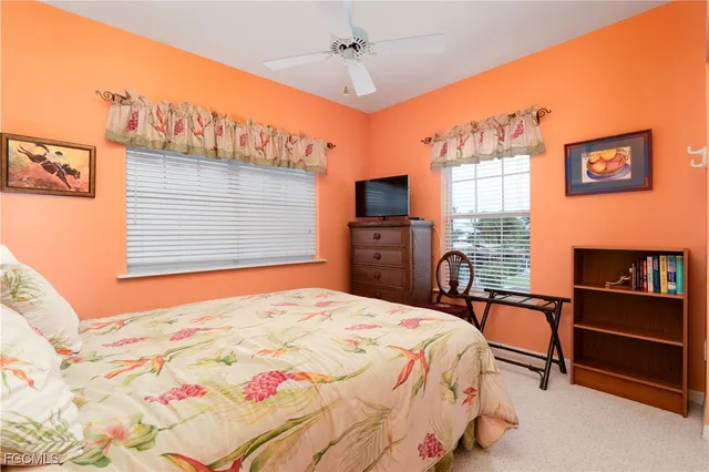 a living room with large windows