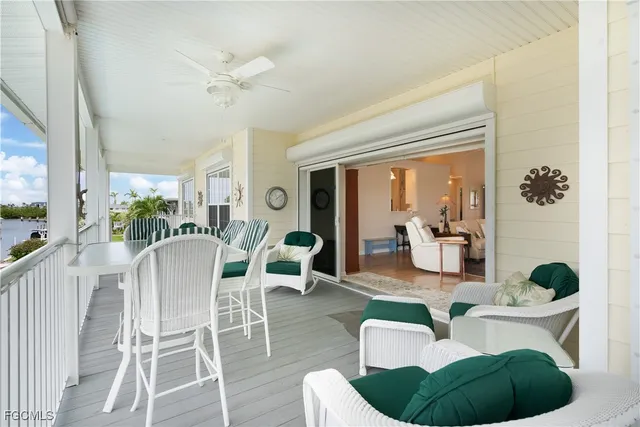 a view of a livingroom with furniture and gym equipment