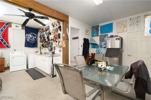 an empty room with sliding glass door and shower