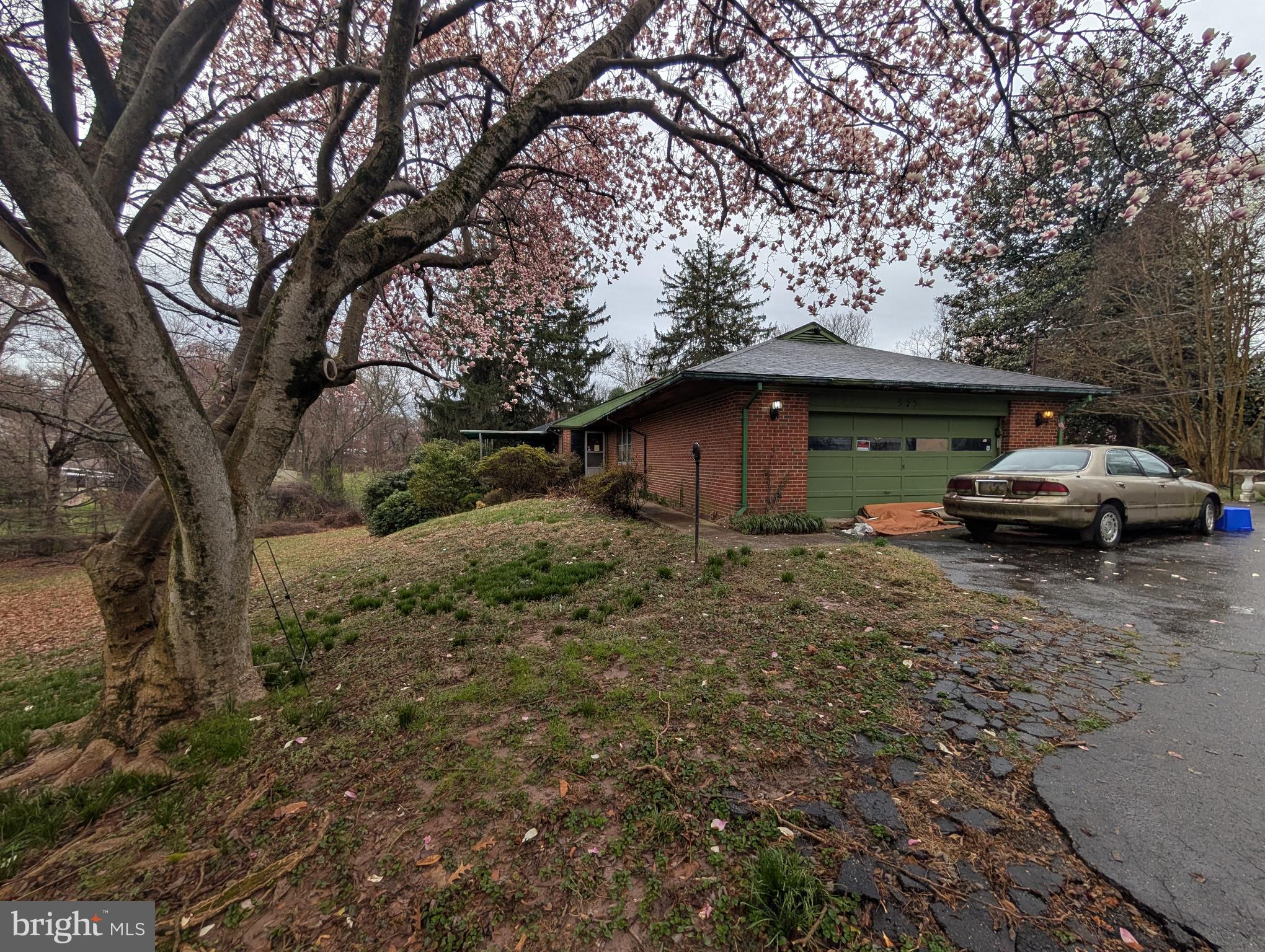 523 Copley Lane Silver Spring, MD 20904 - Photo 3 of 20 a car parked in front of house with a trees