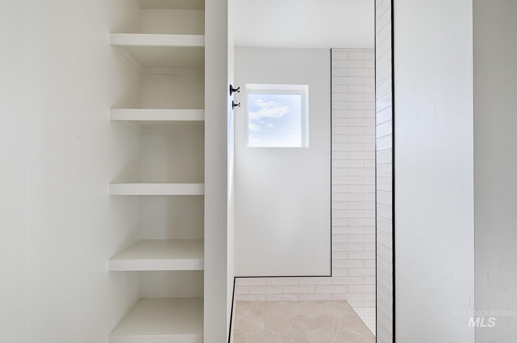 6216 South Wayland Way Meridian, ID 83642 - Photo 22 of 38 Built-in shelving unit providing storage