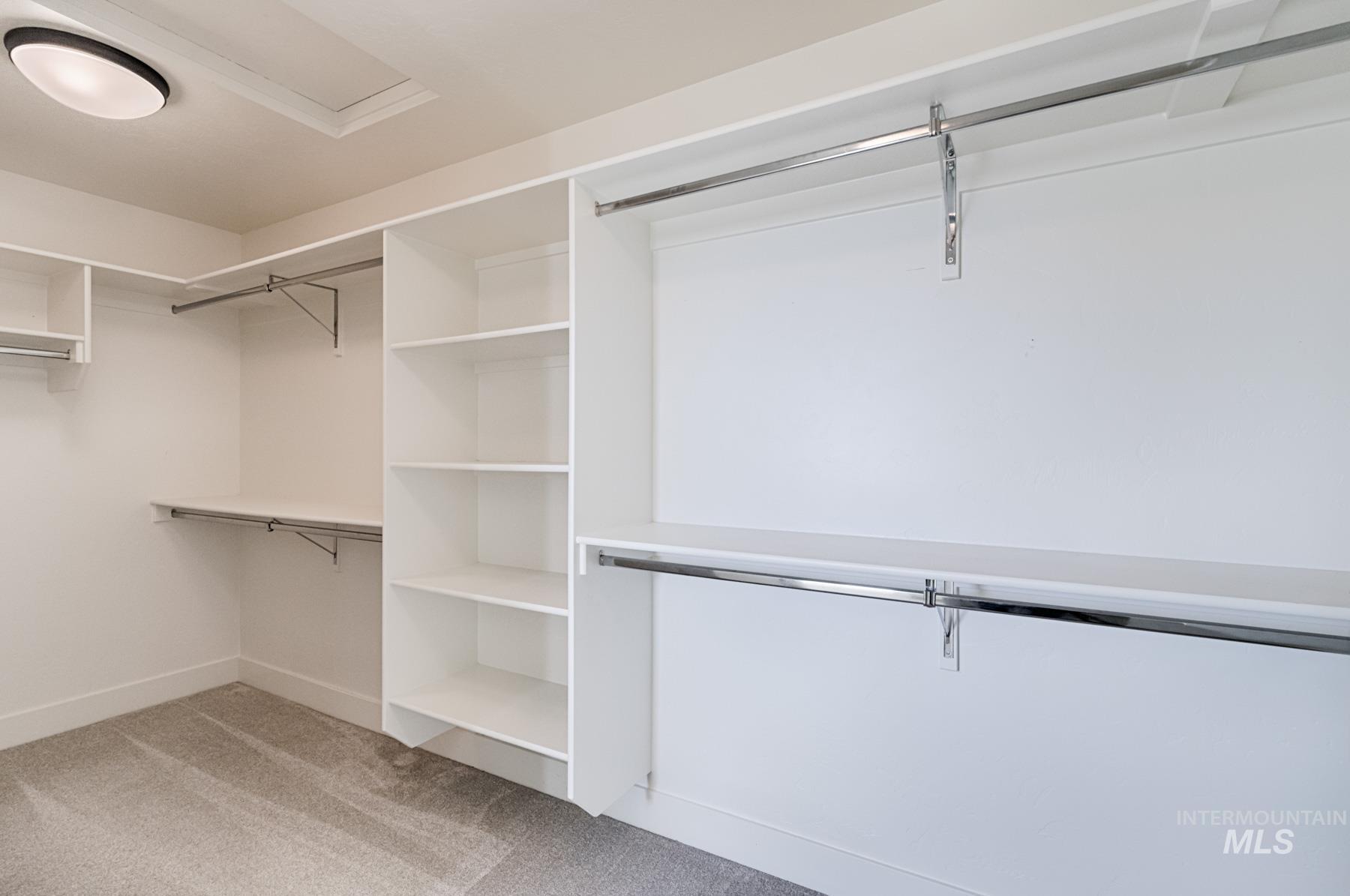 6216 South Wayland Way Meridian, ID 83642 - Photo 24 of 38 Custom-built closet system featuring a blend of shelving and hanging rods