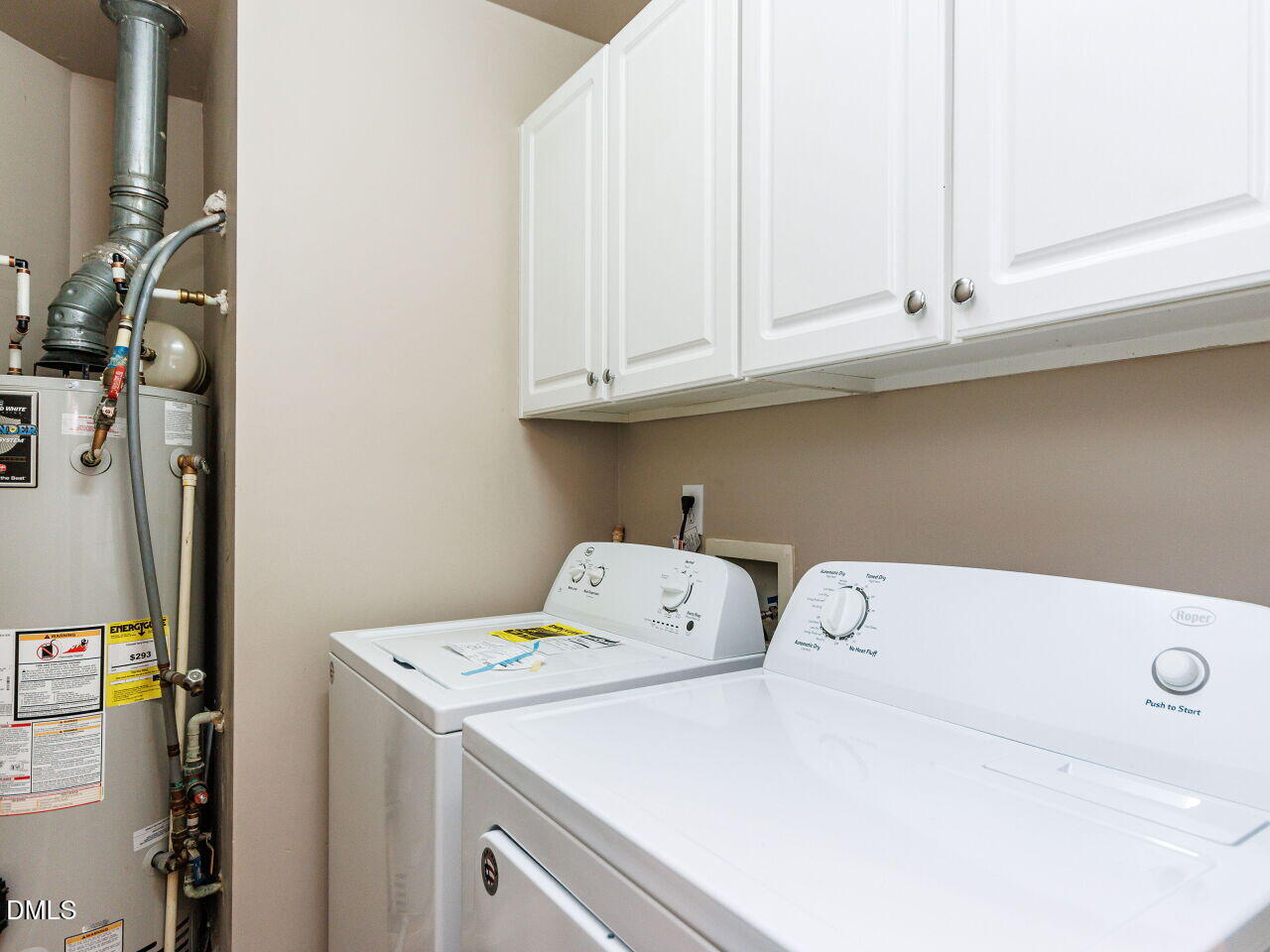 1221 Renshaw Court Cary, NC 27518 - Photo 15 of 29 a utility room with dryer and washer