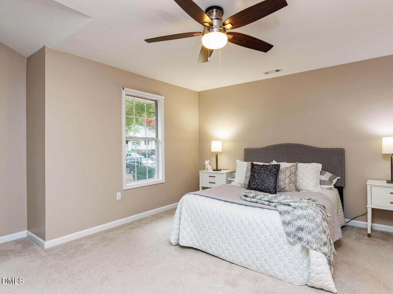 1221 Renshaw Court Cary, NC 27518 - Photo 16 of 29 a bedroom with a large bed and a window