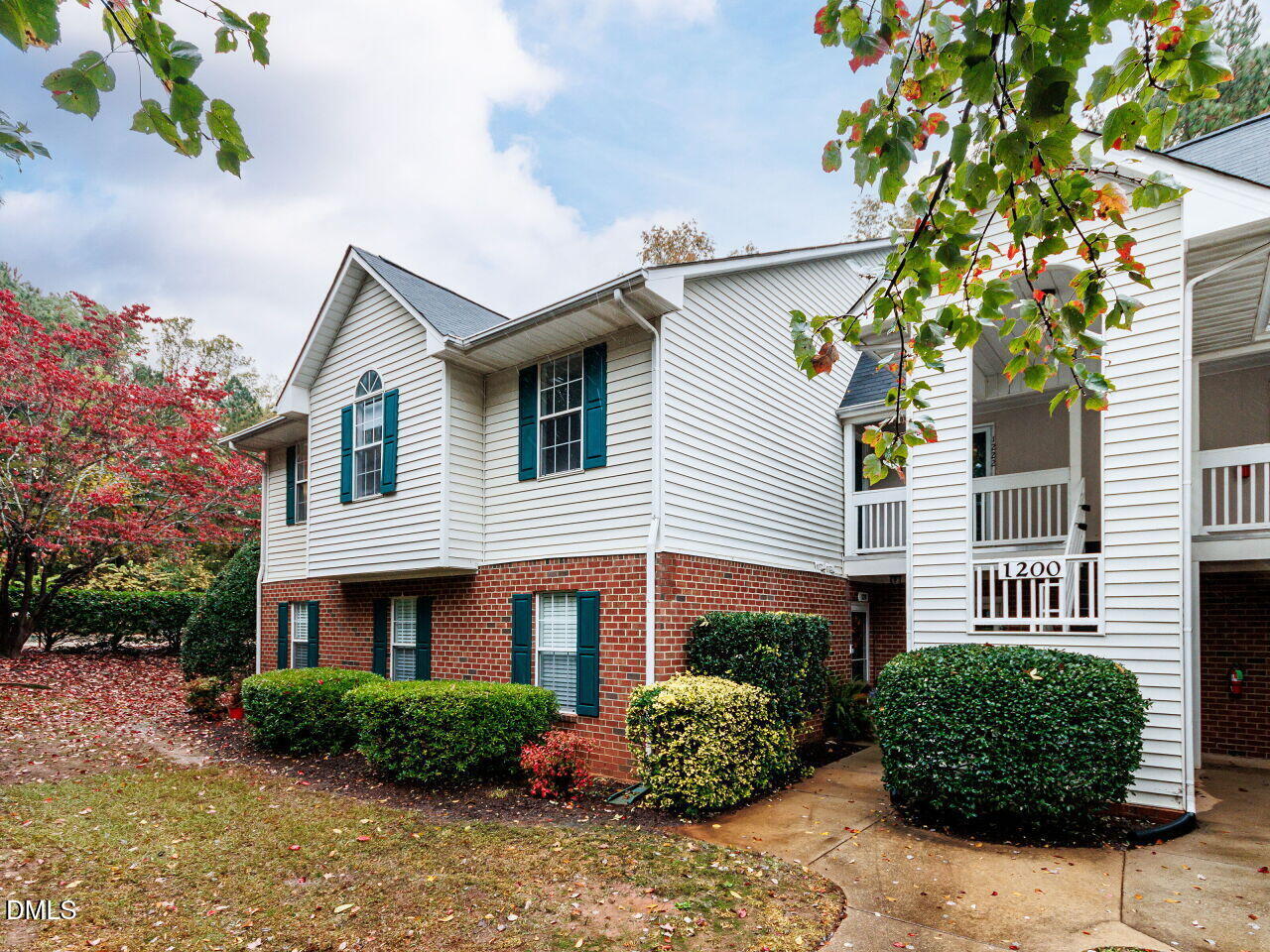 1221 Renshaw Court Cary, NC 27518 - Photo 2 of 29 a front view of a house with garden