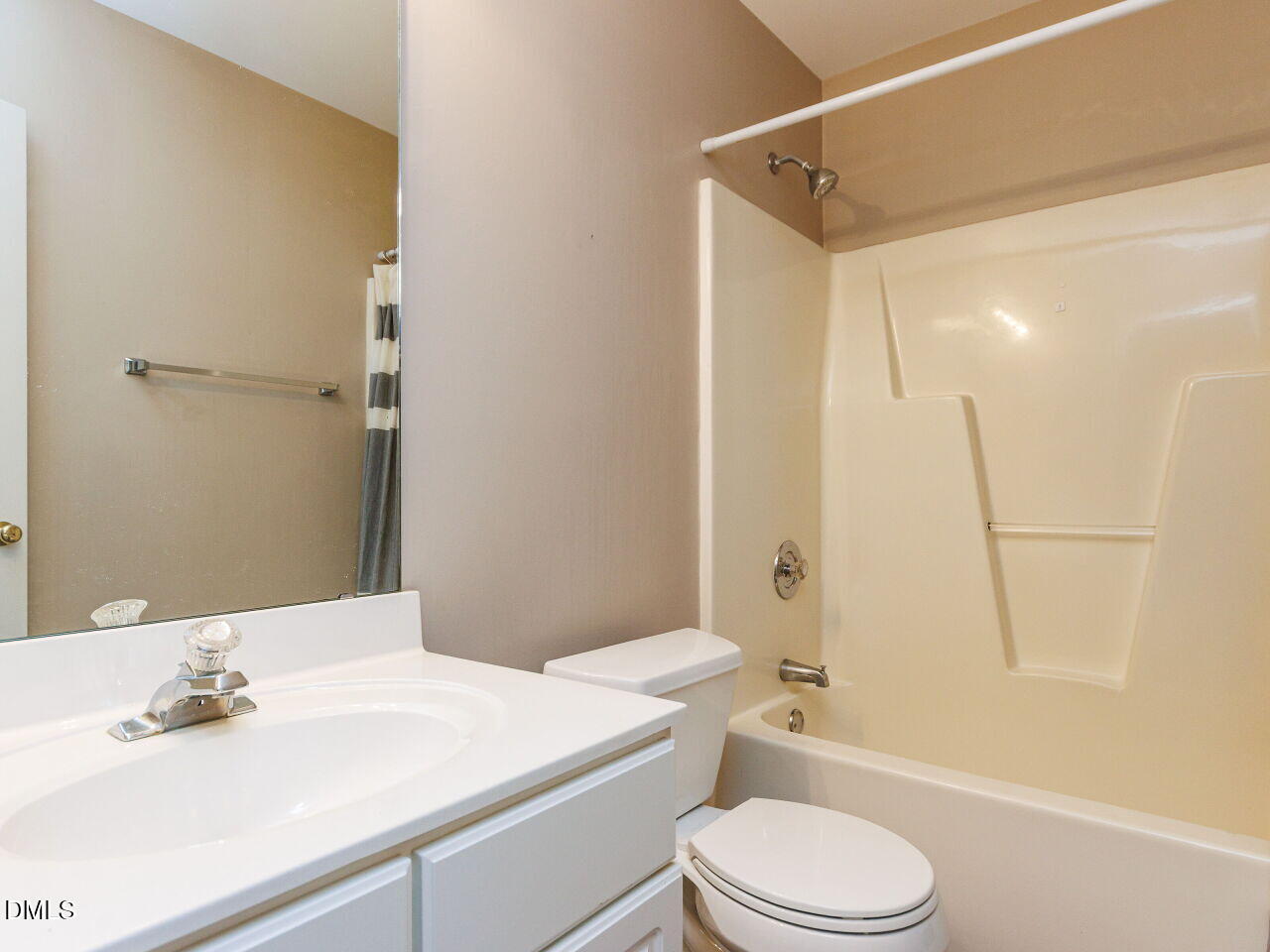 1221 Renshaw Court Cary, NC 27518 - Photo 25 of 29 a bathroom with a sink a toilet and shower