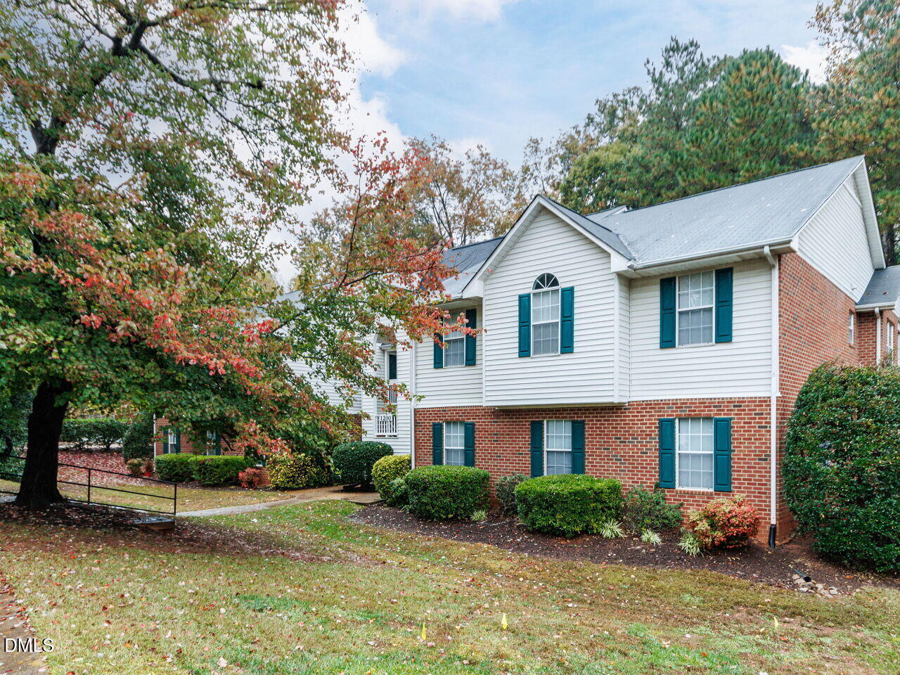 1221 Renshaw Court Cary, NC 27518 - Photo 29 of 29 a front view of a house with a garden and plants