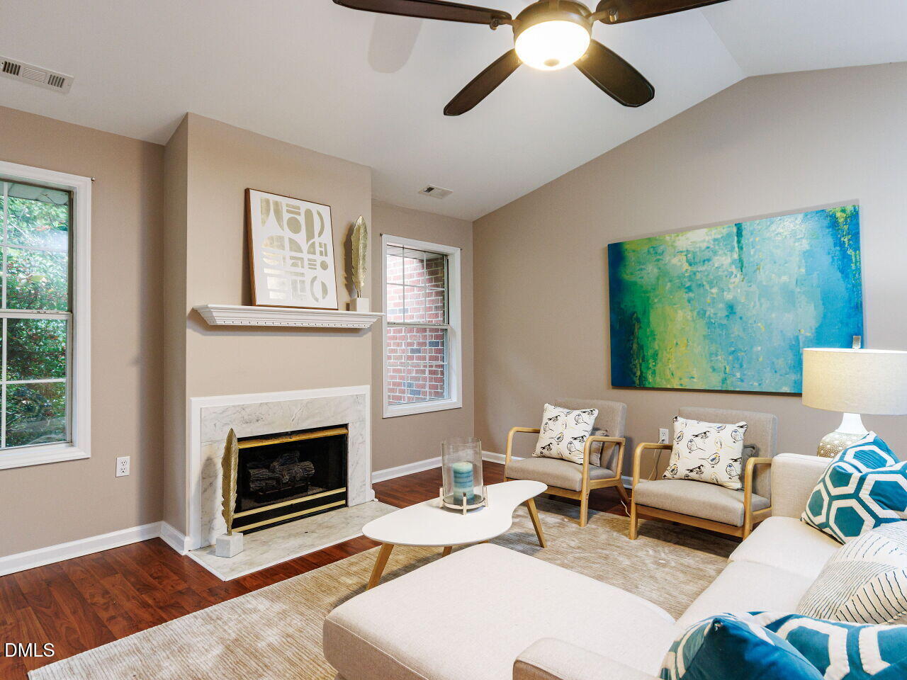 1221 Renshaw Court Cary, NC 27518 - Photo 6 of 29 a living room with furniture and a fireplace