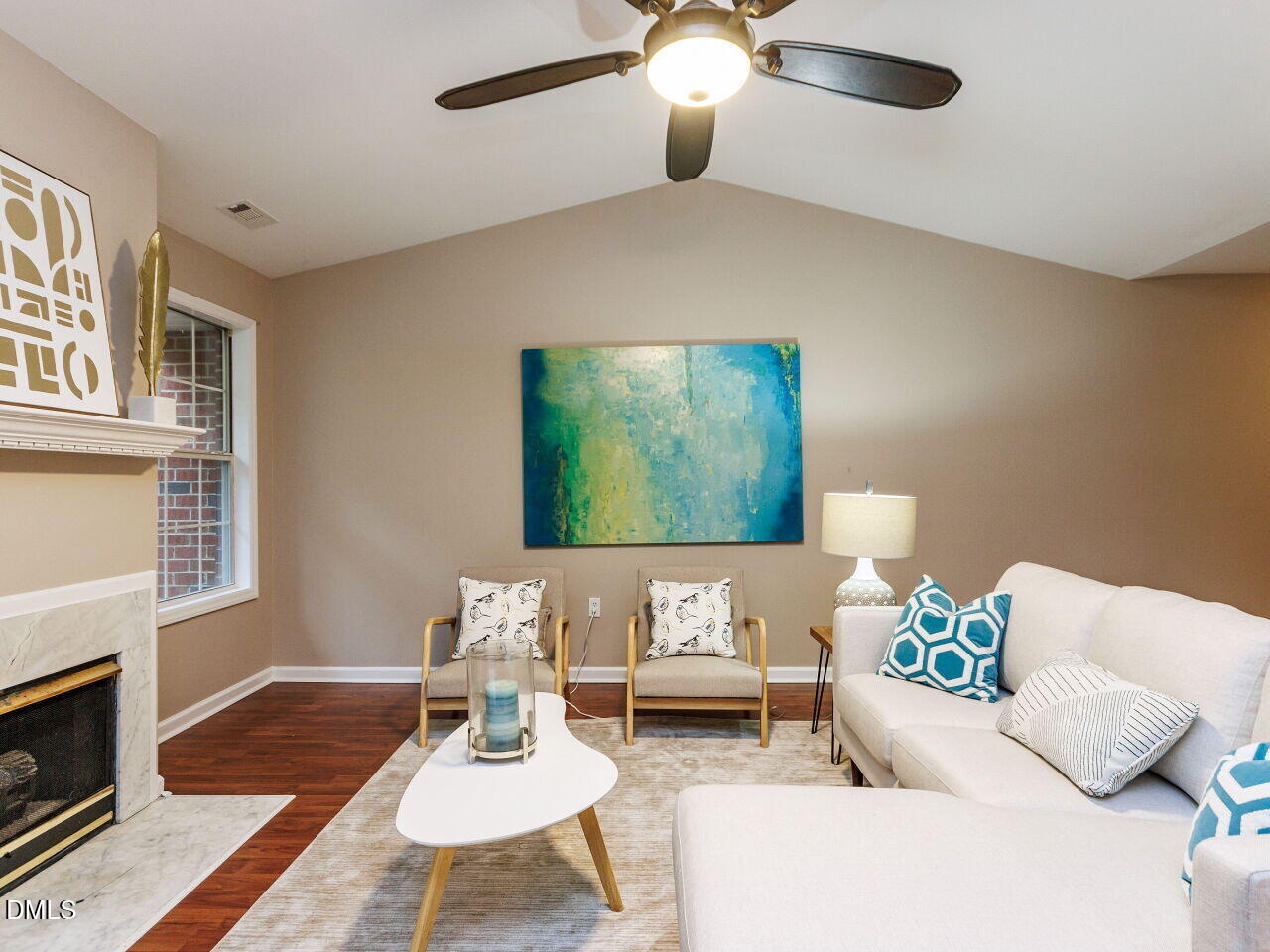1221 Renshaw Court Cary, NC 27518 - Photo 8 of 29 a living room with furniture and a fireplace