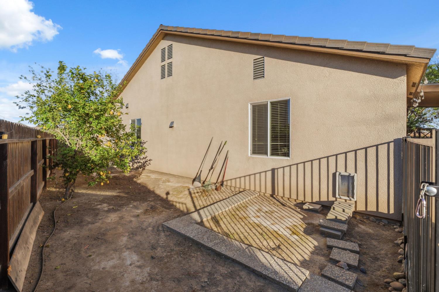 15717 West Botelho Avenue Kerman, CA 93630 - Photo 27 of 43 a view of a balcony with chairs
