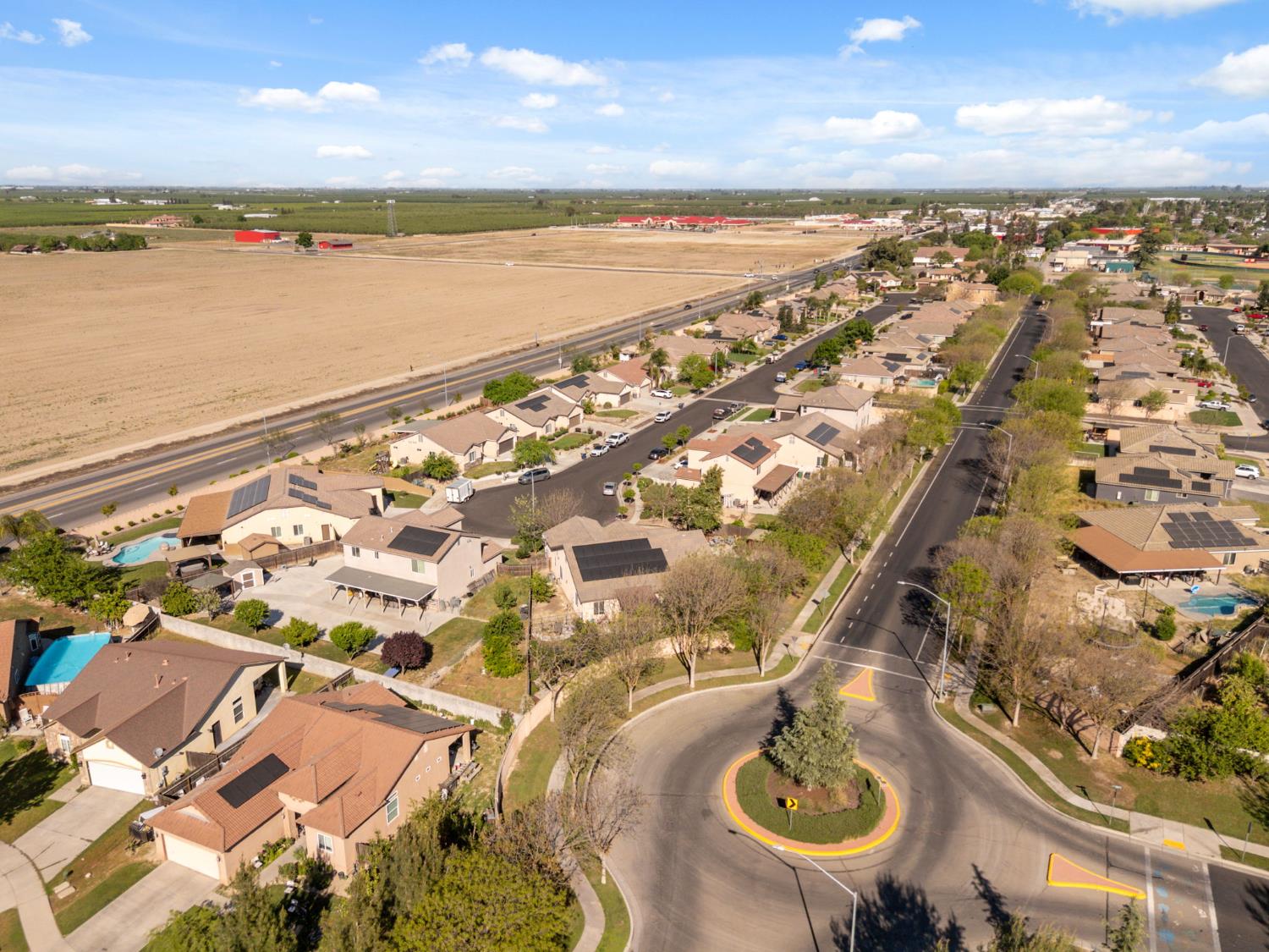 15717 West Botelho Avenue Kerman, CA 93630 - Photo 43 of 43 an aerial view of ocean and residential houses with outdoor space