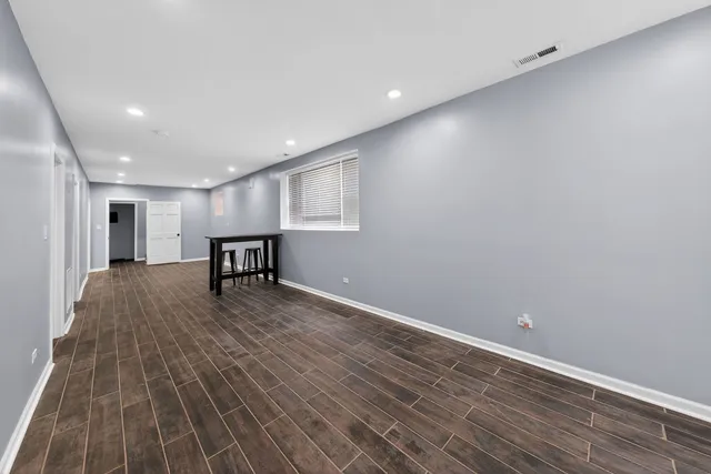 a view of livingroom with furniture and wooden floor