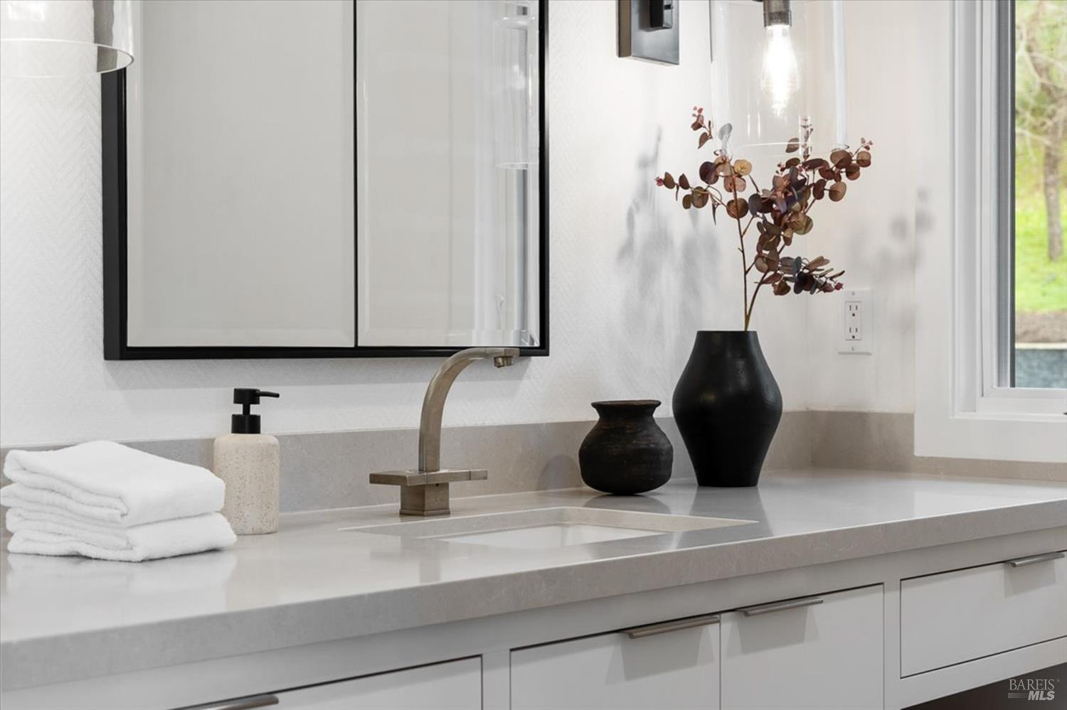 775 Benjamin Way Healdsburg, CA 95448 - Photo 36 of 96 a bathroom with a sink a potted plant and a window
