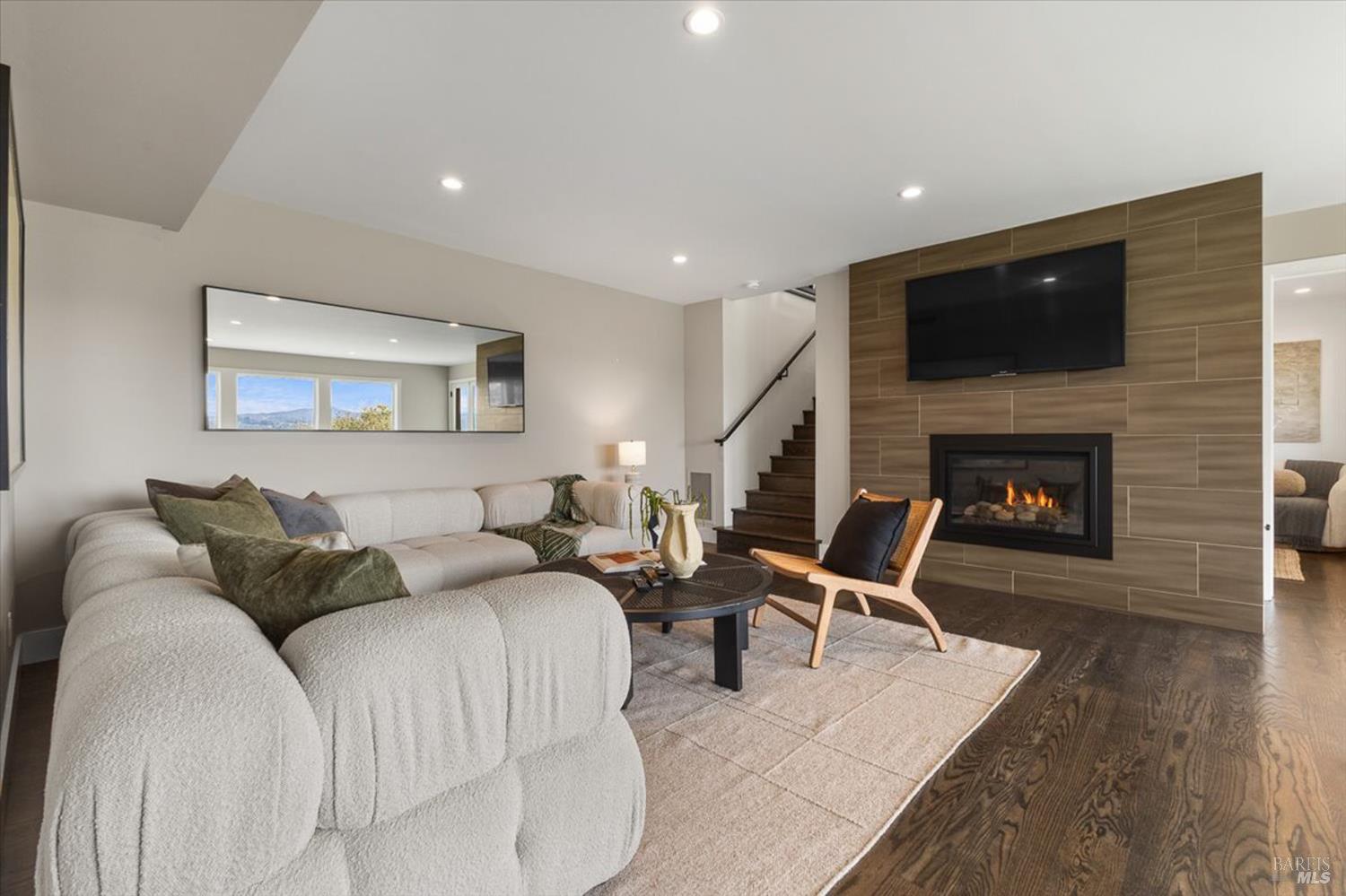 775 Benjamin Way Healdsburg, CA 95448 - Photo 37 of 96 a living room with furniture and a fireplace