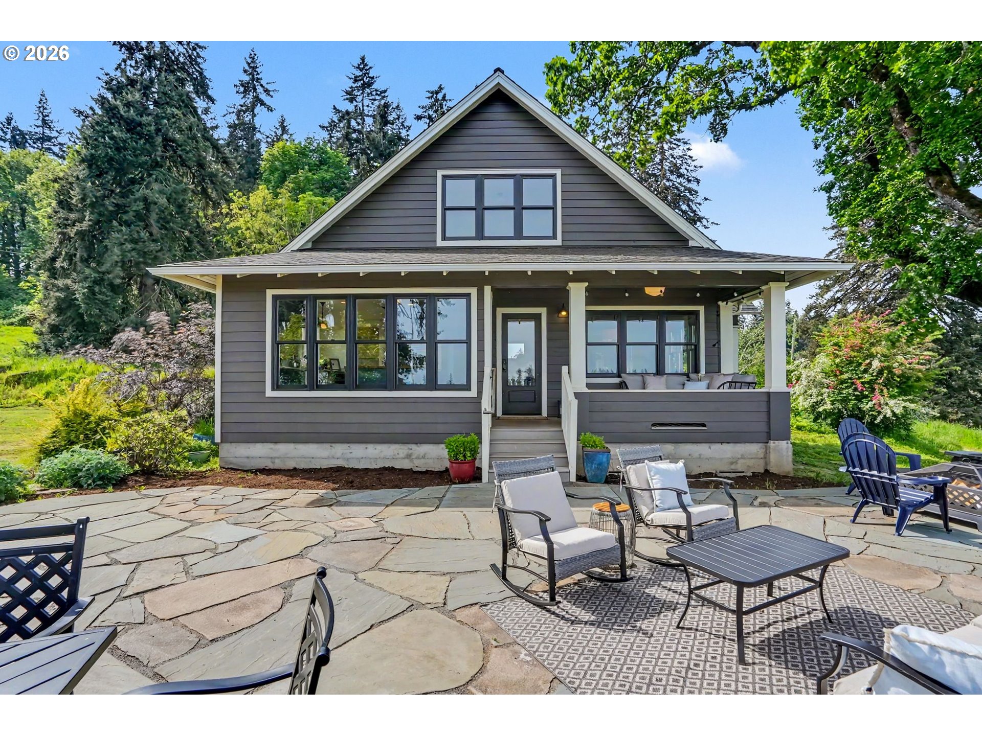 17135 Herigstad Road Northeast Silverton, OR 97381 - Photo 1 of 48 a backyard of a house with seating space