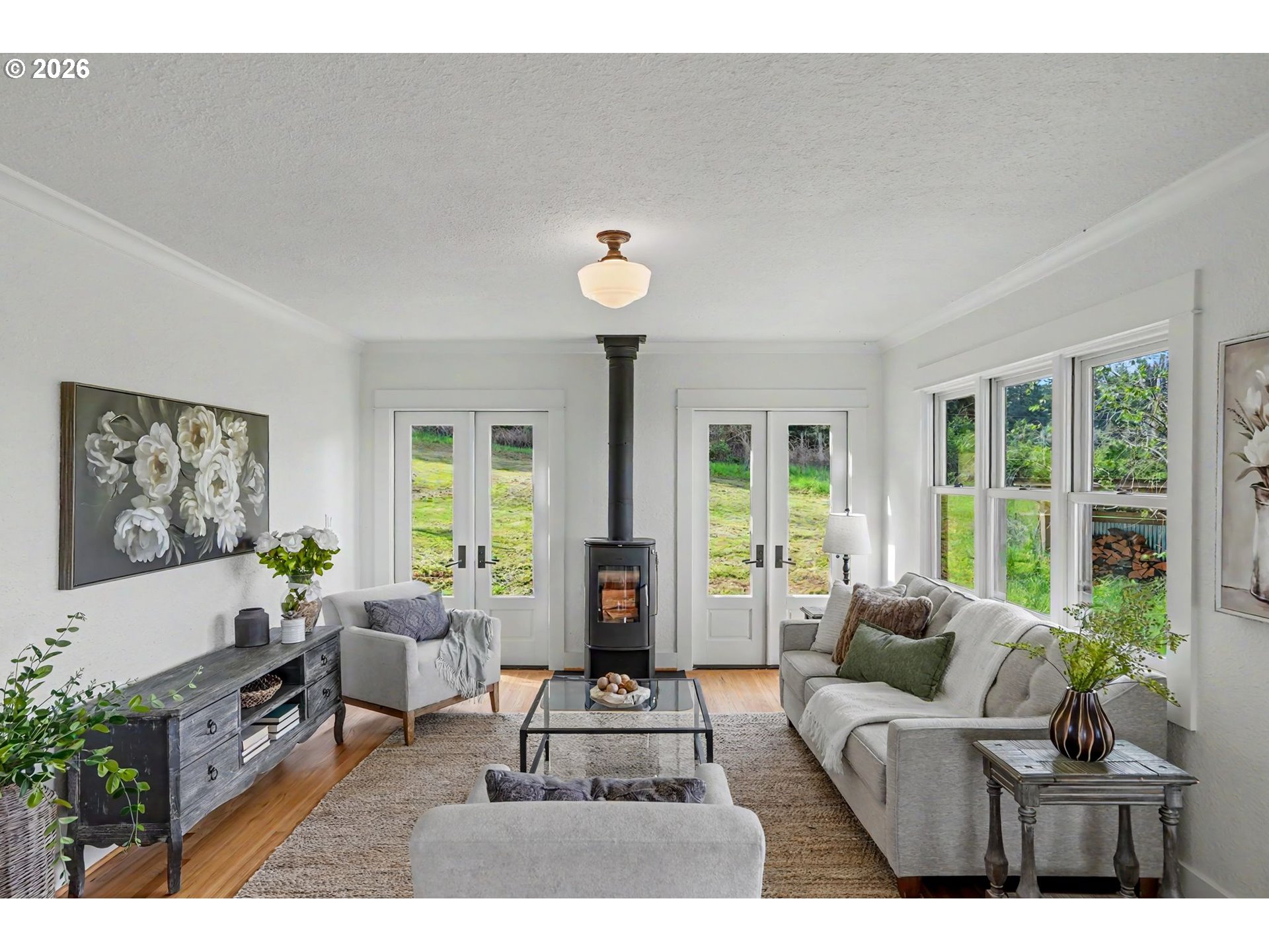 17135 Herigstad Road Northeast Silverton, OR 97381 - Photo 19 of 48 a living room with furniture and a large window