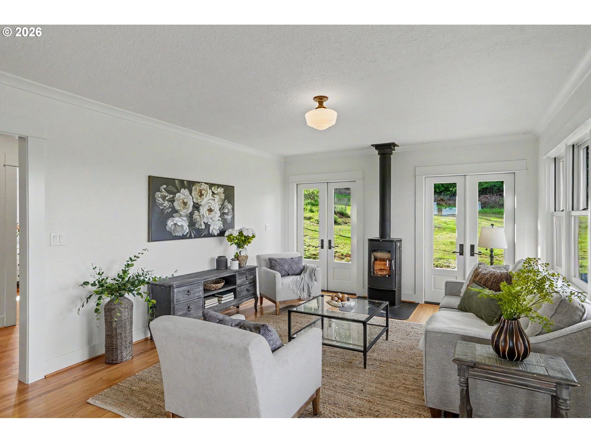 17135 Herigstad Road Northeast Silverton, OR 97381 - Photo 20 of 48 a living room with furniture potted plant and a window