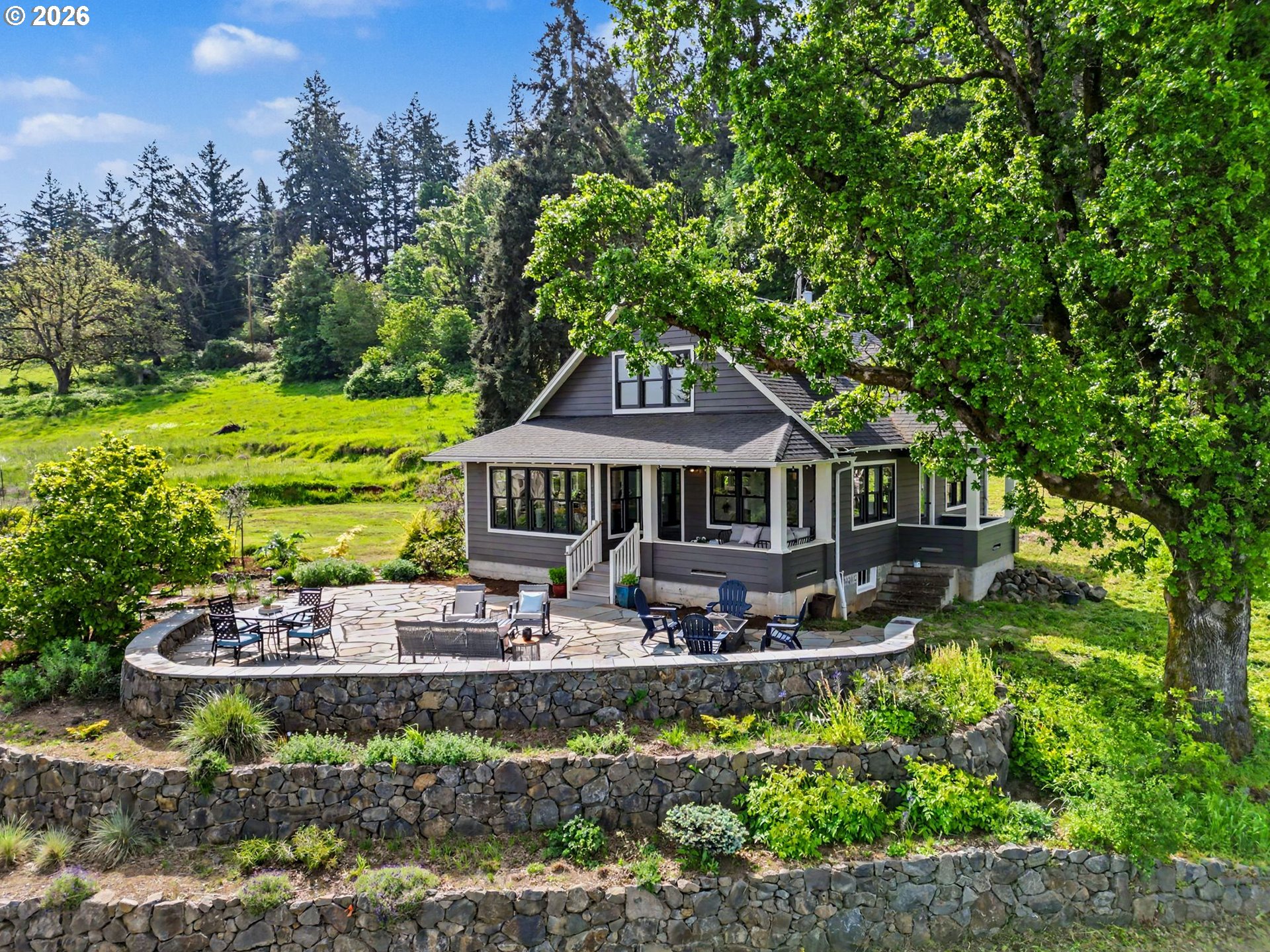 17135 Herigstad Road Northeast Silverton, OR 97381 - Photo 2 of 48 a front view of a house with garden