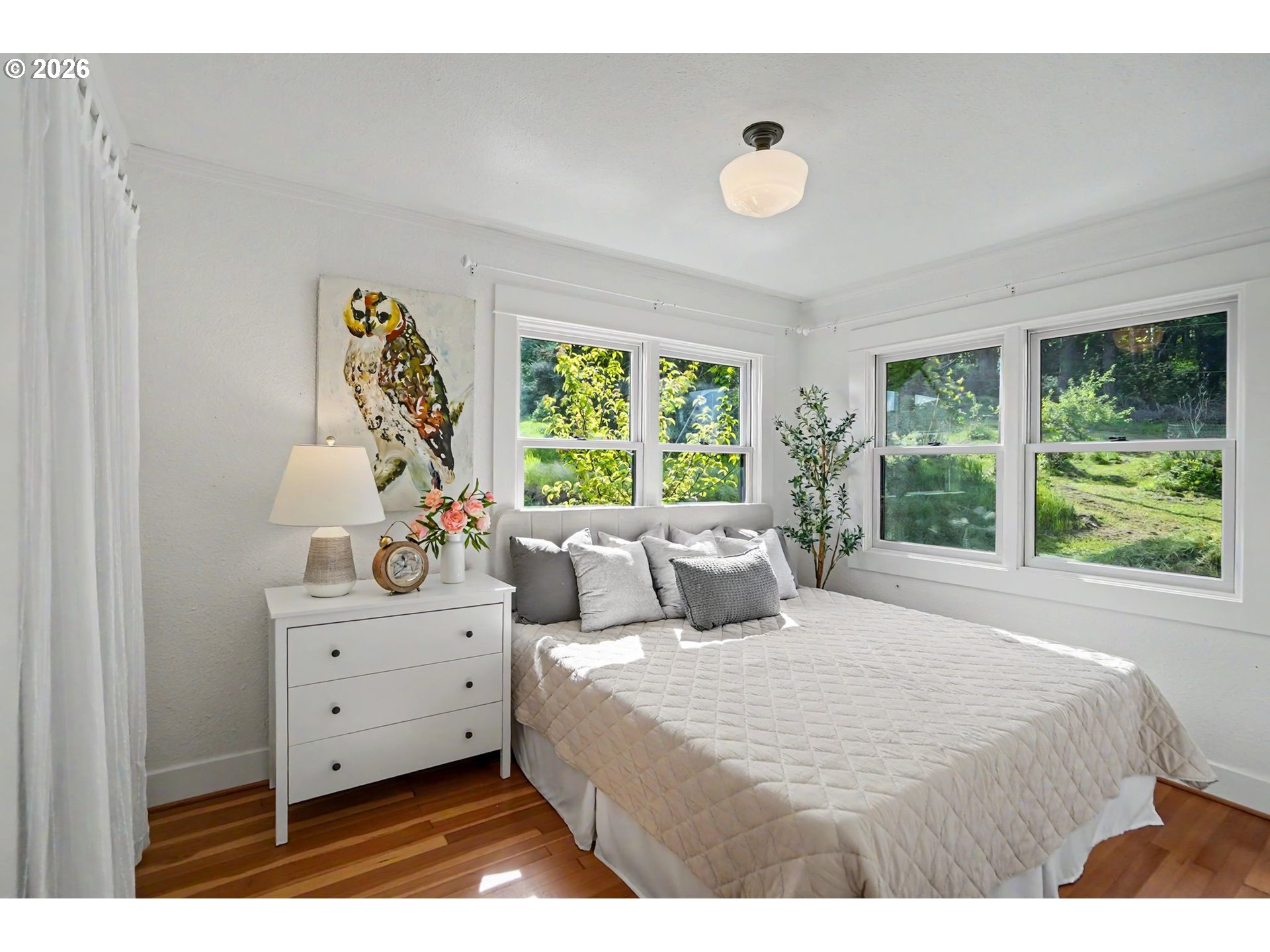 17135 Herigstad Road Northeast Silverton, OR 97381 - Photo 23 of 48 a bedroom with a bed and a window