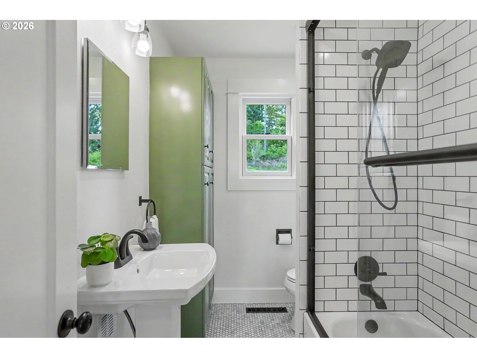 17135 Herigstad Road Northeast Silverton, OR 97381 - Photo 25 of 48 a bathroom with a sink a toilet and shower