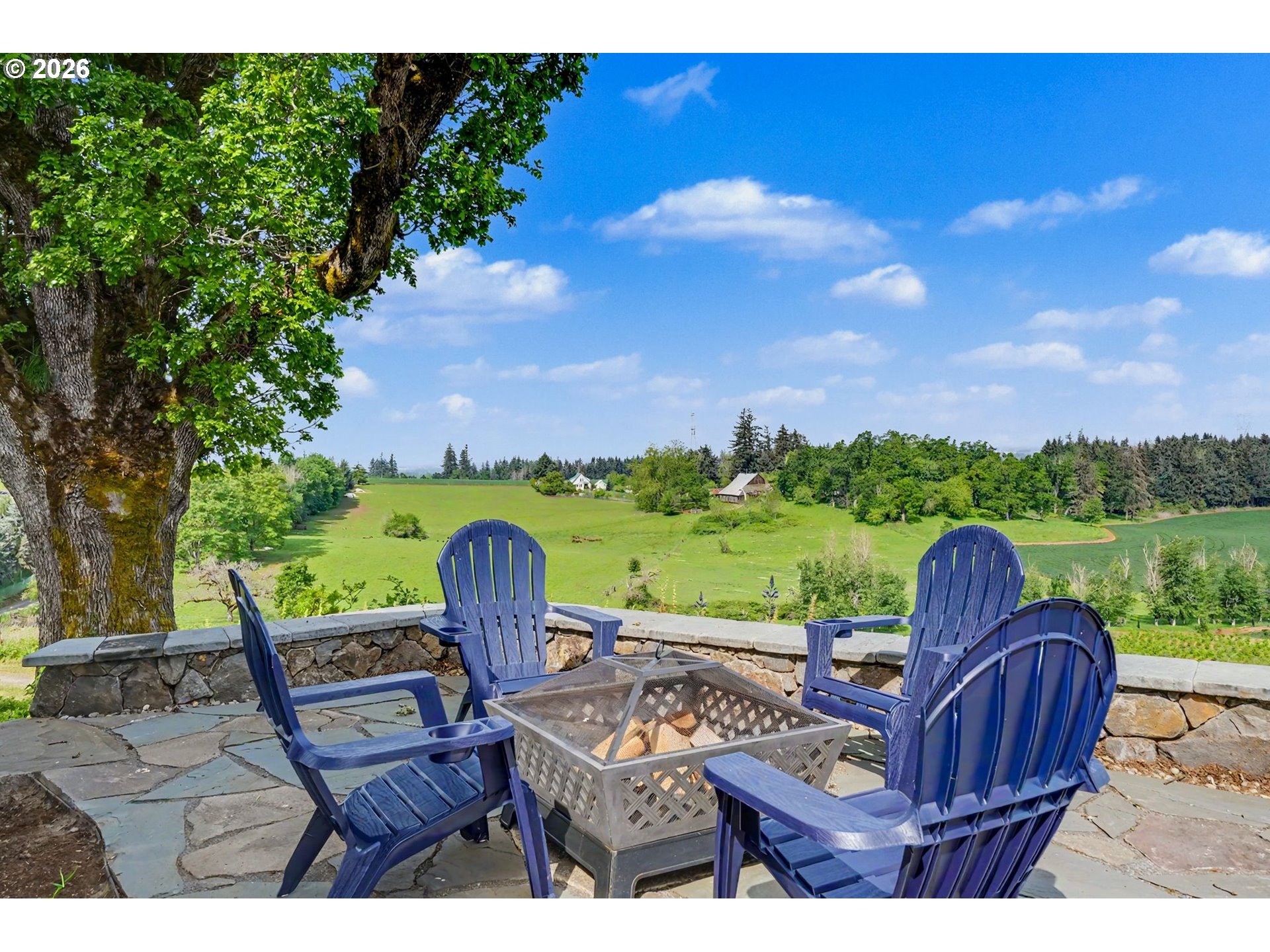 17135 Herigstad Road Northeast Silverton, OR 97381 - Photo 42 of 48 a view of a table and chairs in the patio