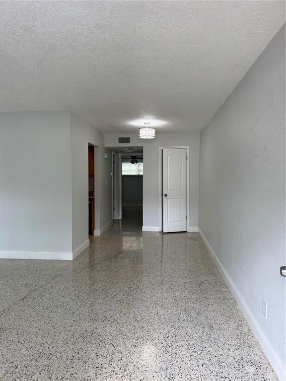 4200 1st Street Northeast, Unit 2 St. Petersburg, FL 33703 - Photo 4 of 5 a view of an empty room and a window
