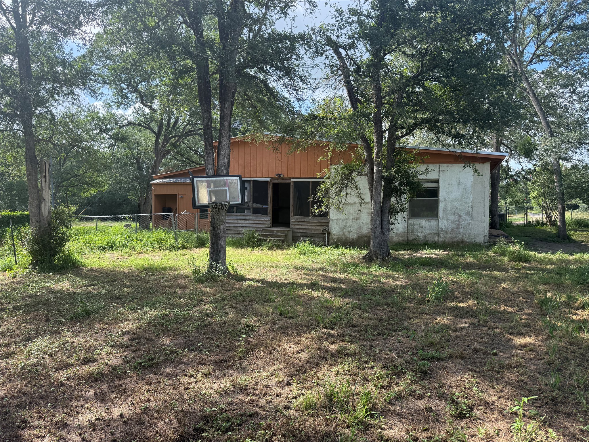 254 Lone Star Road Bastrop, TX 78602 - Photo 18 of 20 Rear view of the home.