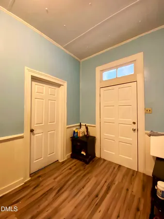 a bedroom with a bed and cabinets