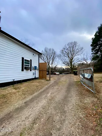a house with trees in front of it