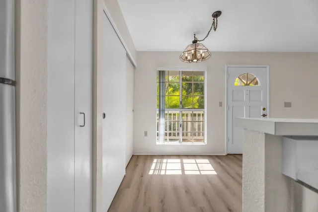 a view of workspace with wooden floor