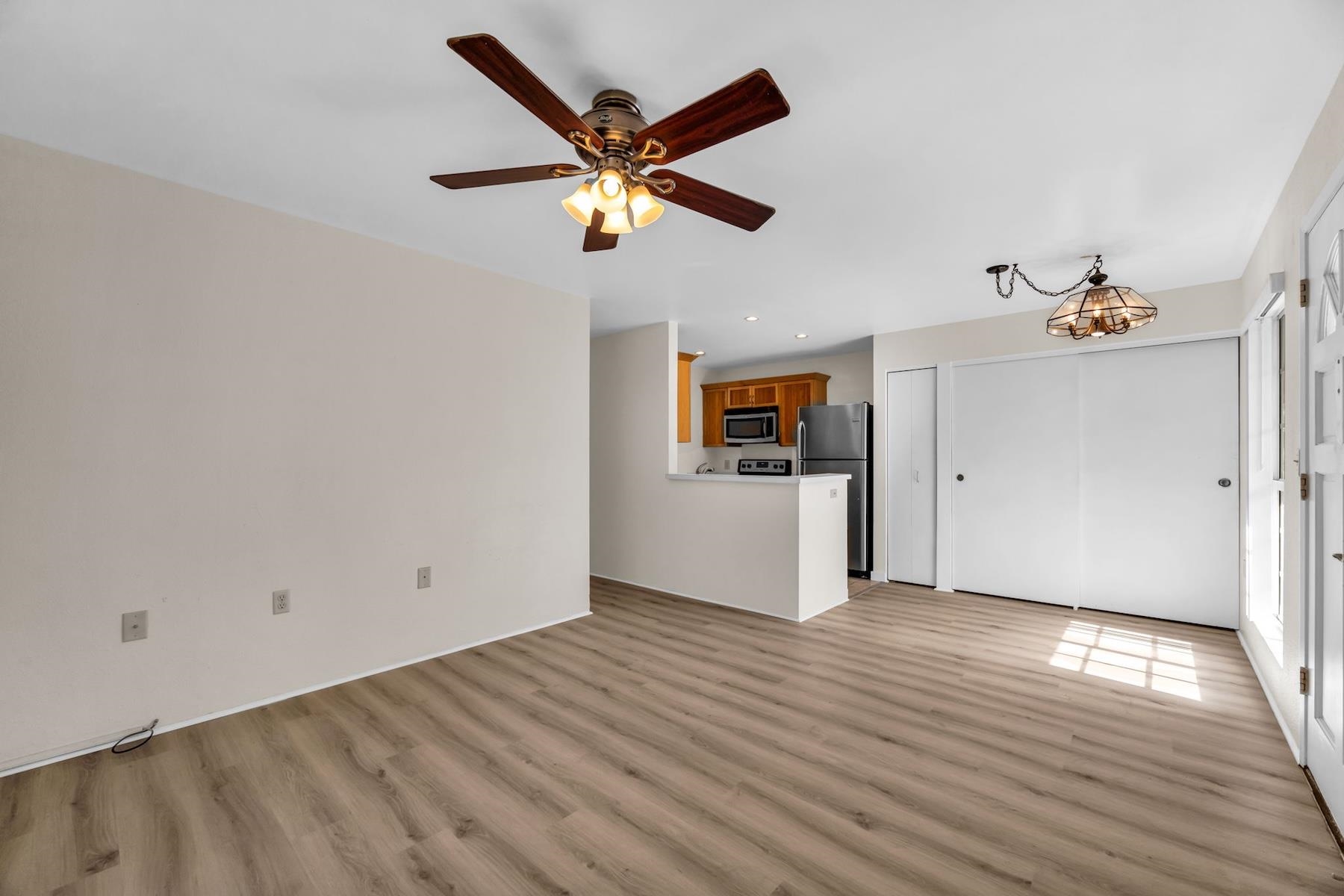 160 Keonekai Road, Unit 18202 Kihei, HI 96753 - Photo 3 of 25 wooden floor in an empty room