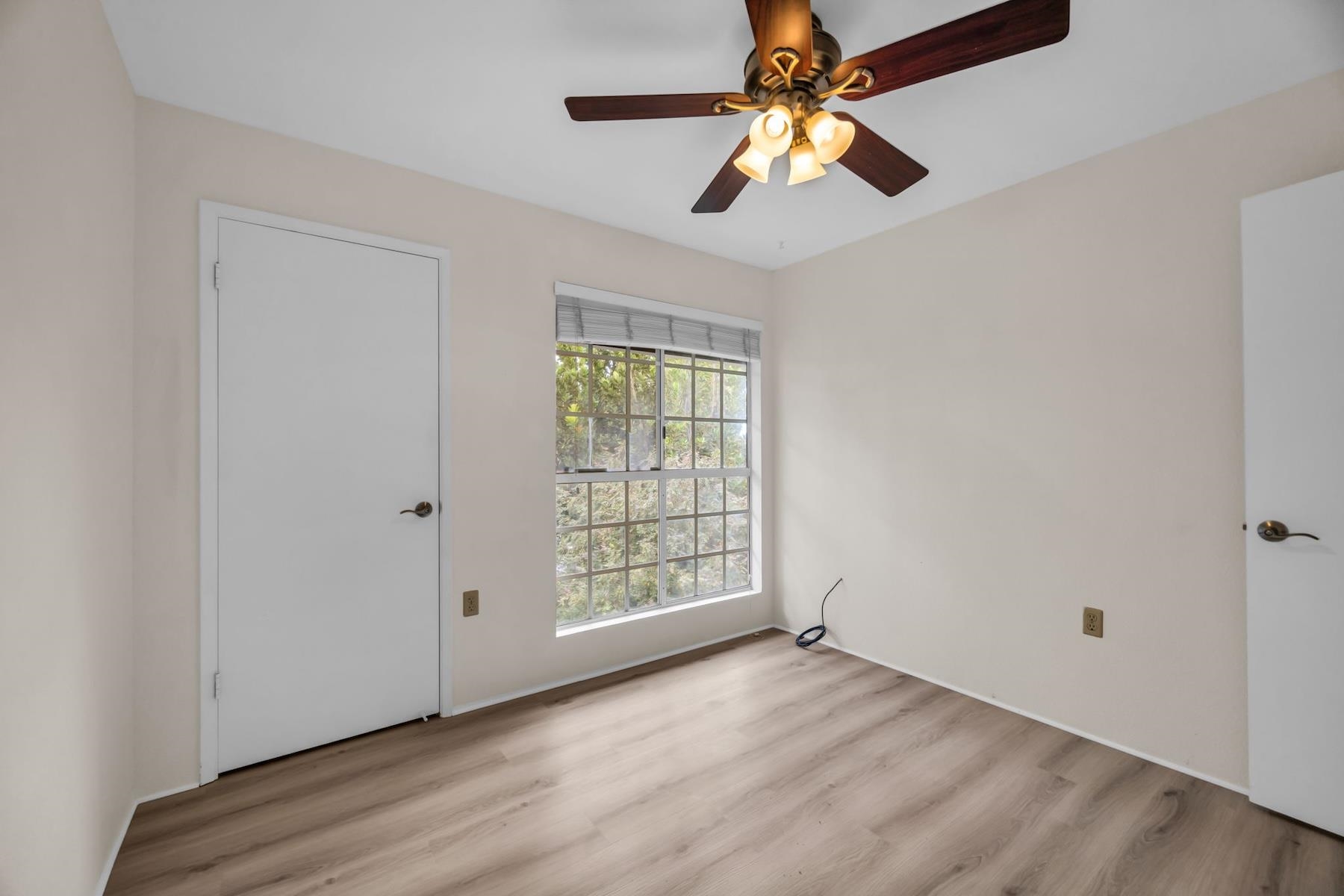 160 Keonekai Road, Unit 18202 Kihei, HI 96753 - Photo 7 of 25 an empty room with windows and fan