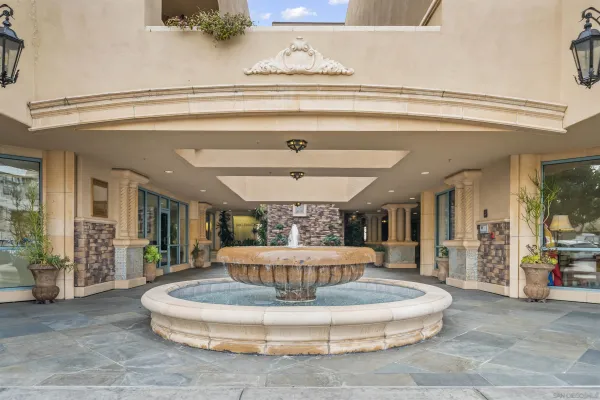 a view of entryway with flower pots