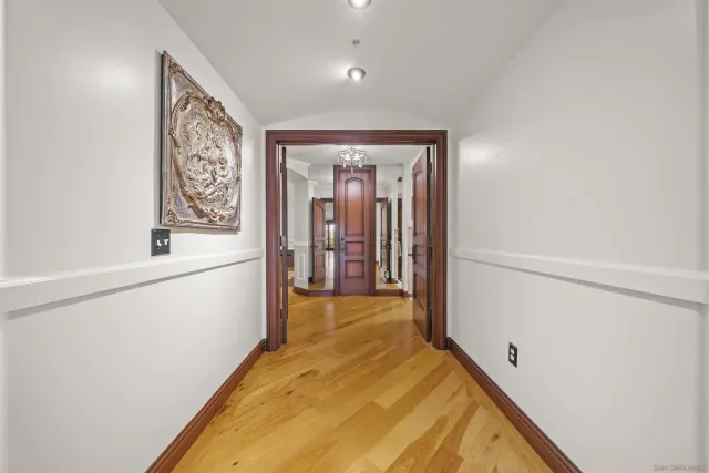 a spacious bathroom with a granite countertop sink mirror and shower