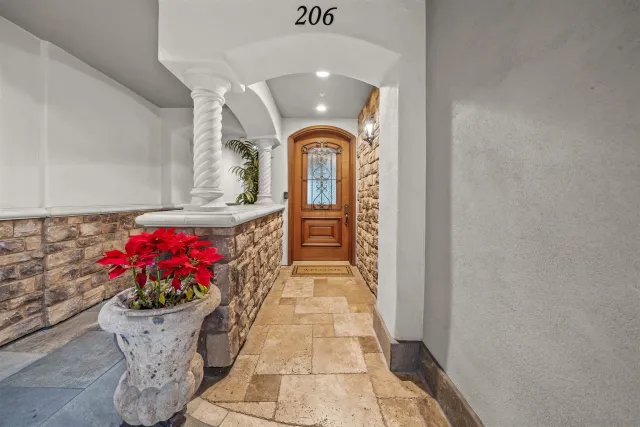 a view of a room with wooden floor and stairs
