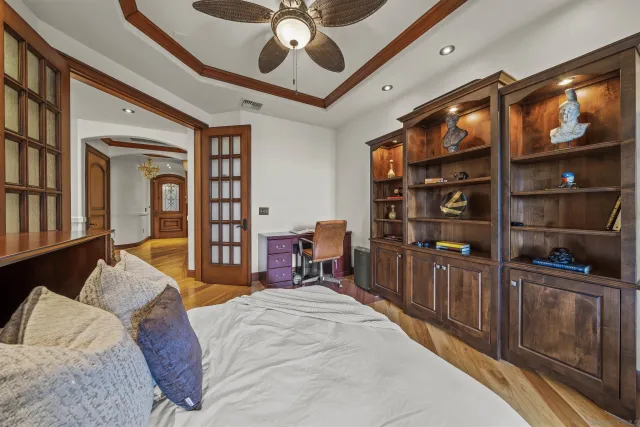 a living room with furniture a fireplace and a kitchen