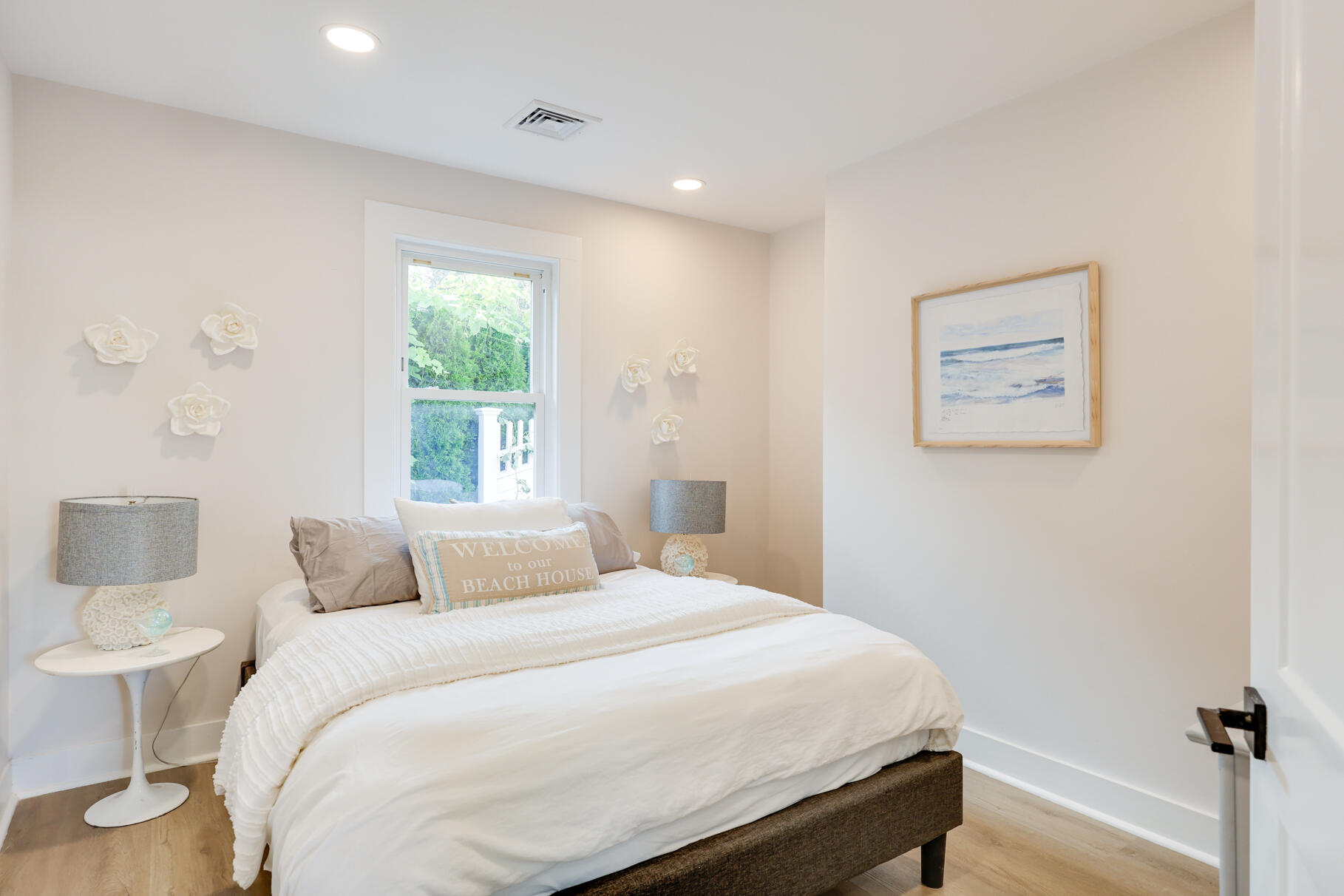38 Sunset Lane Osterville, MA 02655 - Photo 14 of 39 a bedroom with a bed and a painting on the wall