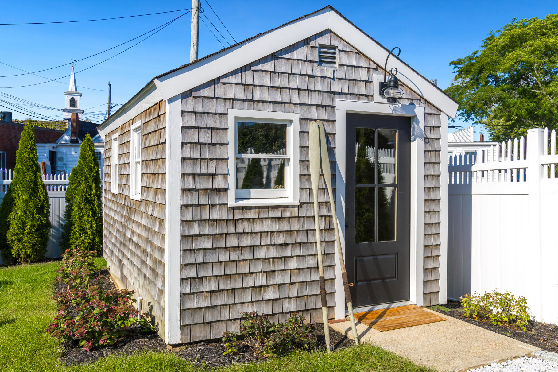 38 Sunset Lane Osterville, MA 02655 - Photo 30 of 39 a front view of a house with a yard