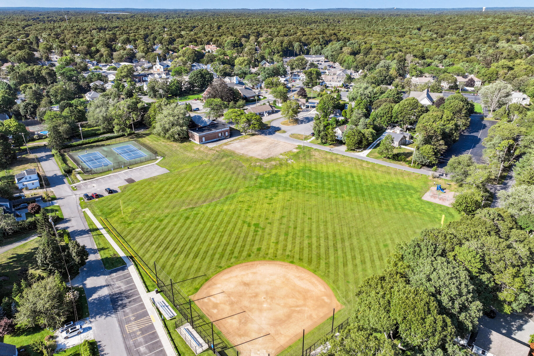 38 Sunset Lane Osterville, MA 02655 - Photo 39 of 39 an aerial view of a house with a yard and lake view