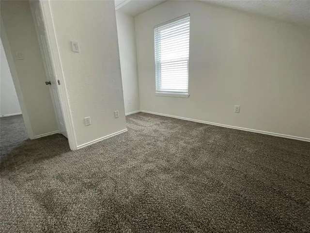 a view of a livingroom with a staircase