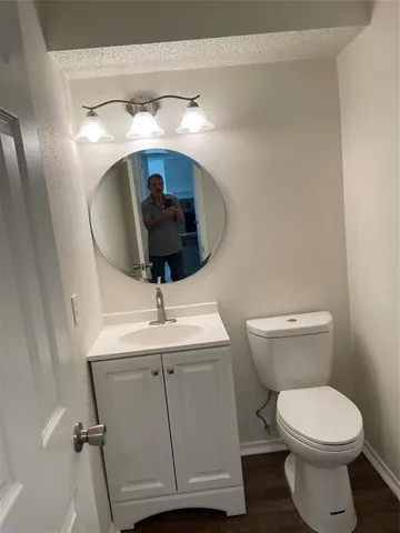 a bathroom with a toilet and a sink