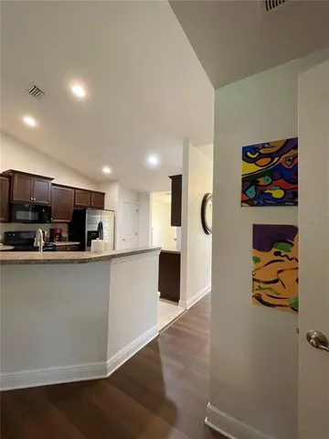 a view of a workspace with furniture