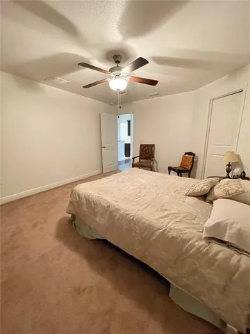 a bathroom with a shower and a mirror