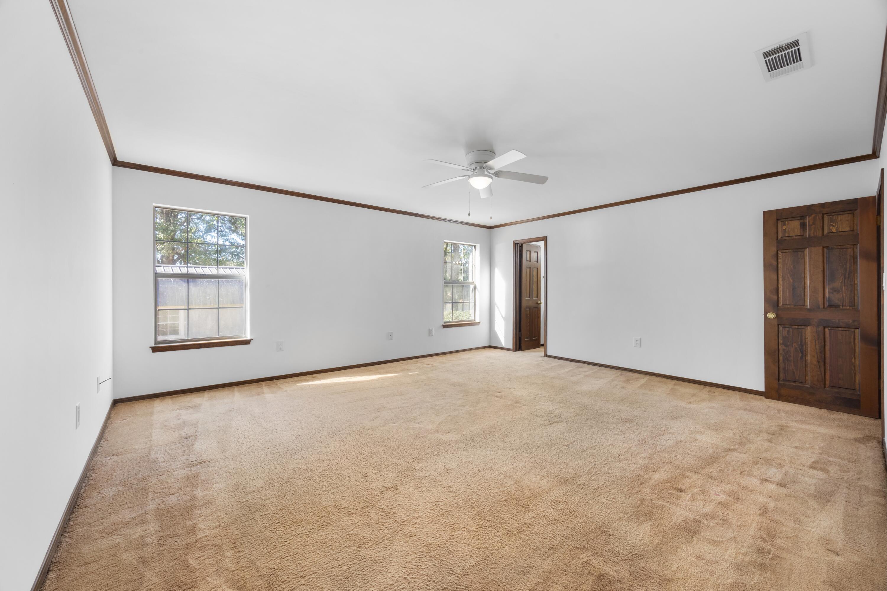 3066 Craig Terrace Crestview, FL 32539 - Photo 21 of 43 a view of an empty room with a window