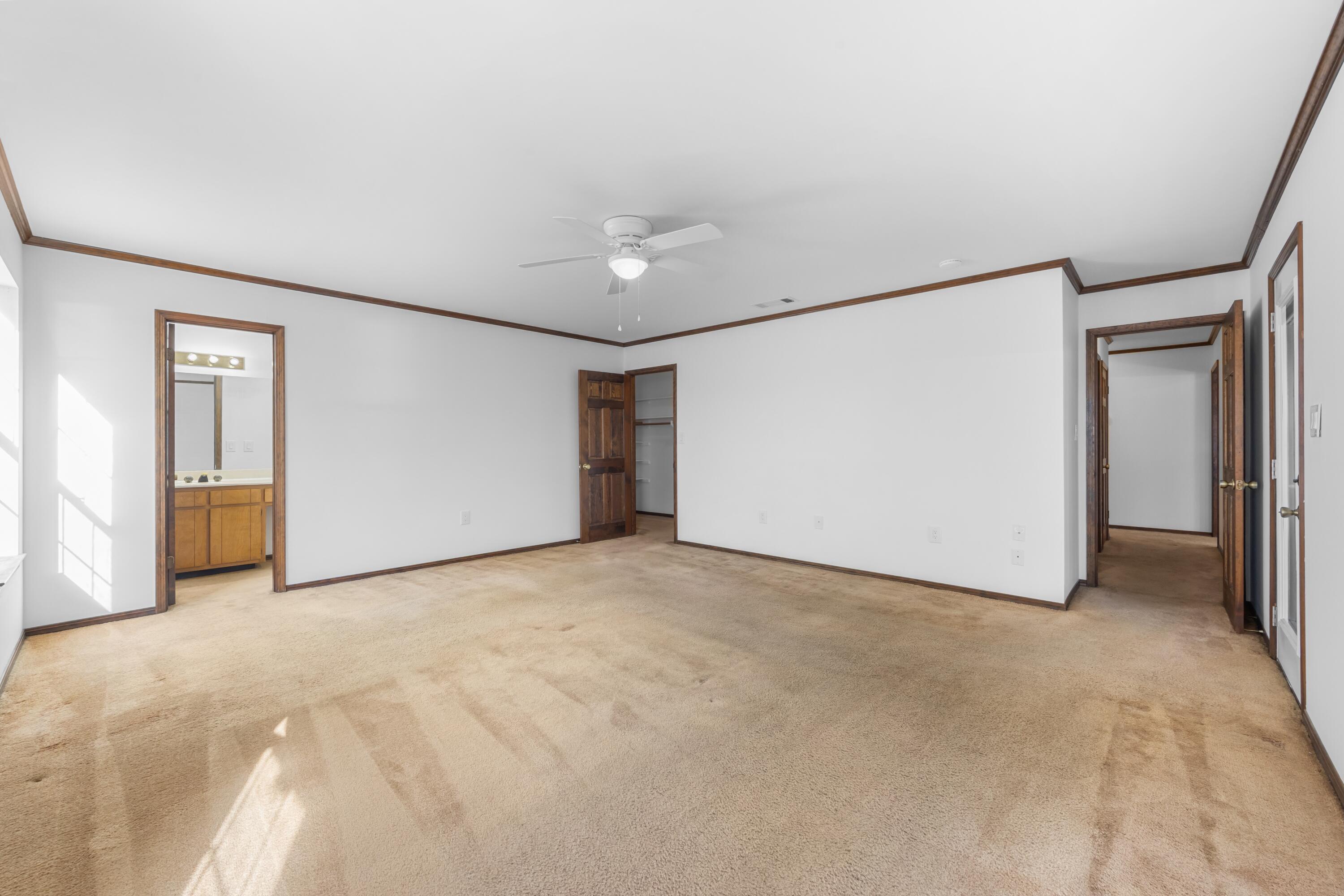 3066 Craig Terrace Crestview, FL 32539 - Photo 22 of 43 a view of an empty room with a kitchen
