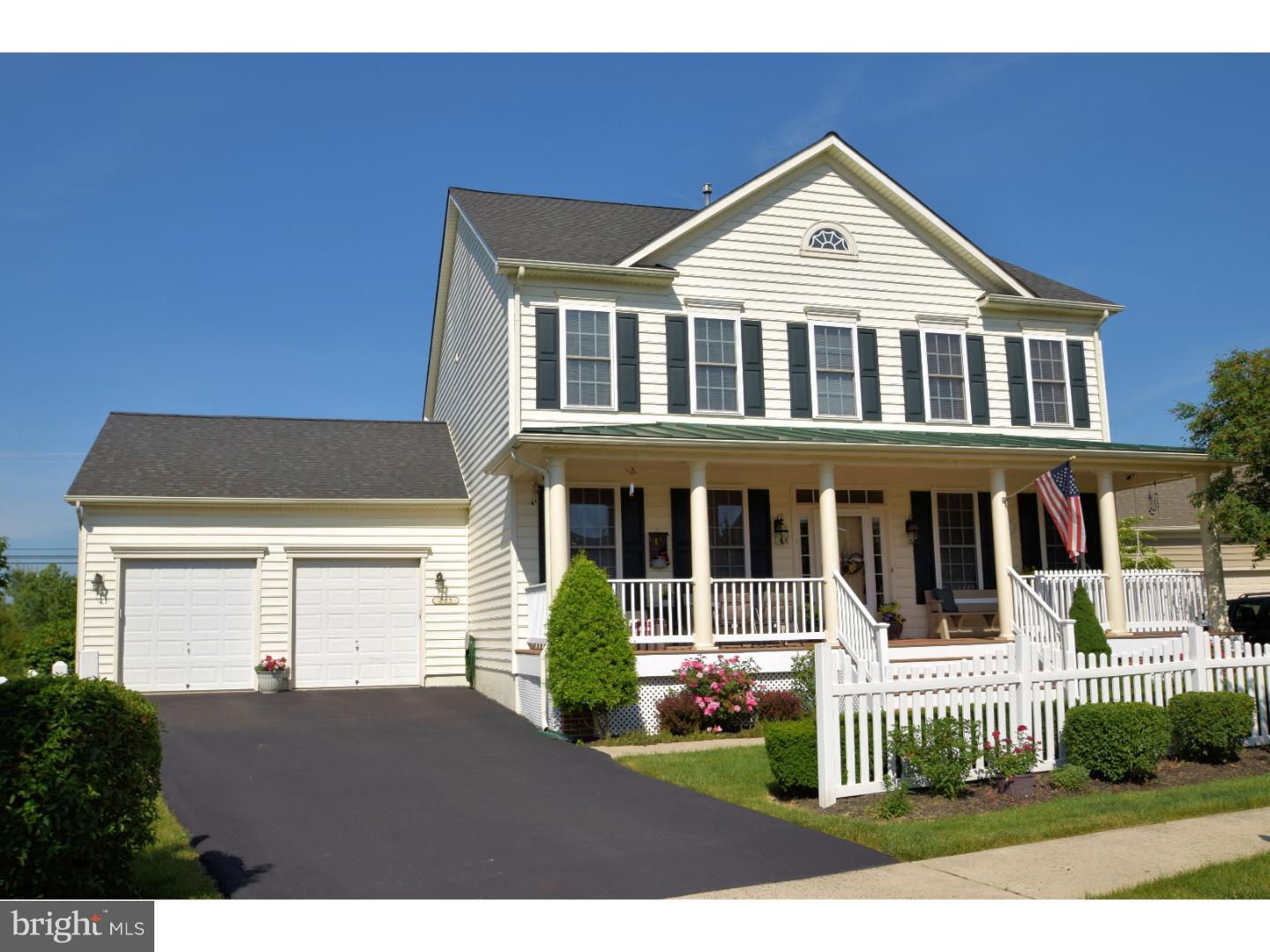 205 Barnhill Road Perkasie, PA 18944 - Photo 1 of 25 a front view of a house with a garden