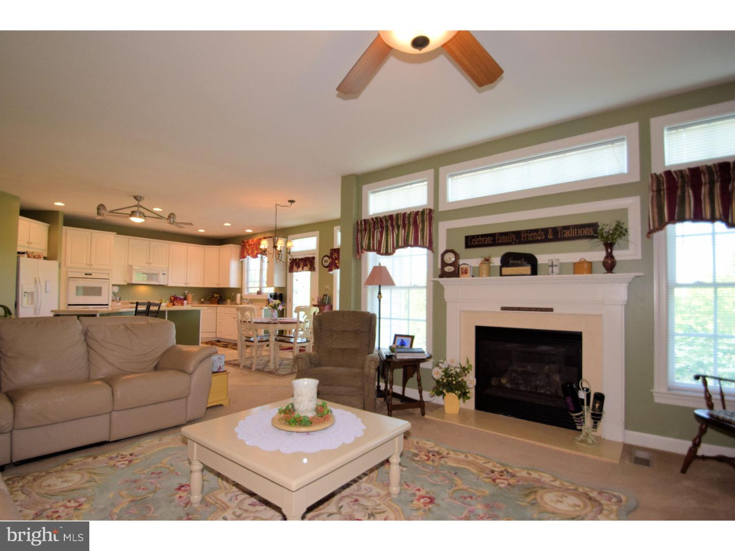 205 Barnhill Road Perkasie, PA 18944 - Photo 14 of 25 a living room with furniture and a fireplace